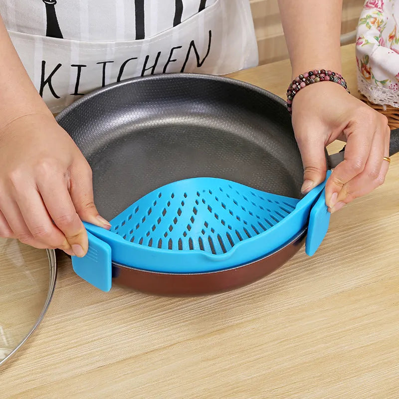 Silicone clip-on kitchen funnel strainer for draining liquids from pots with buckle attachment