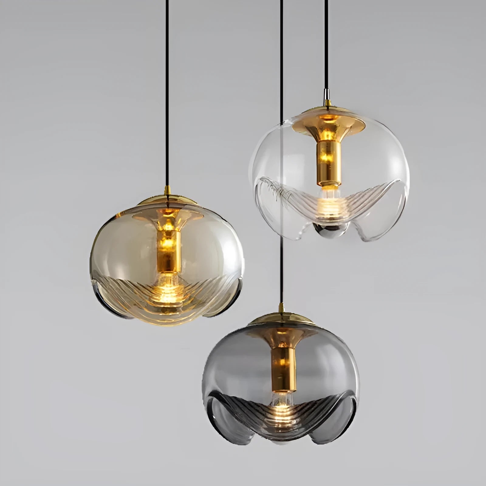 Modern minimalist glass bedside chandelier with 250mm diameter, shown in transparent, amber, and smoky grey colour options.