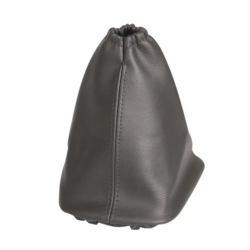 Black leather car shift lever dust cover shown with dimensions 15.2cm by 12.9cm