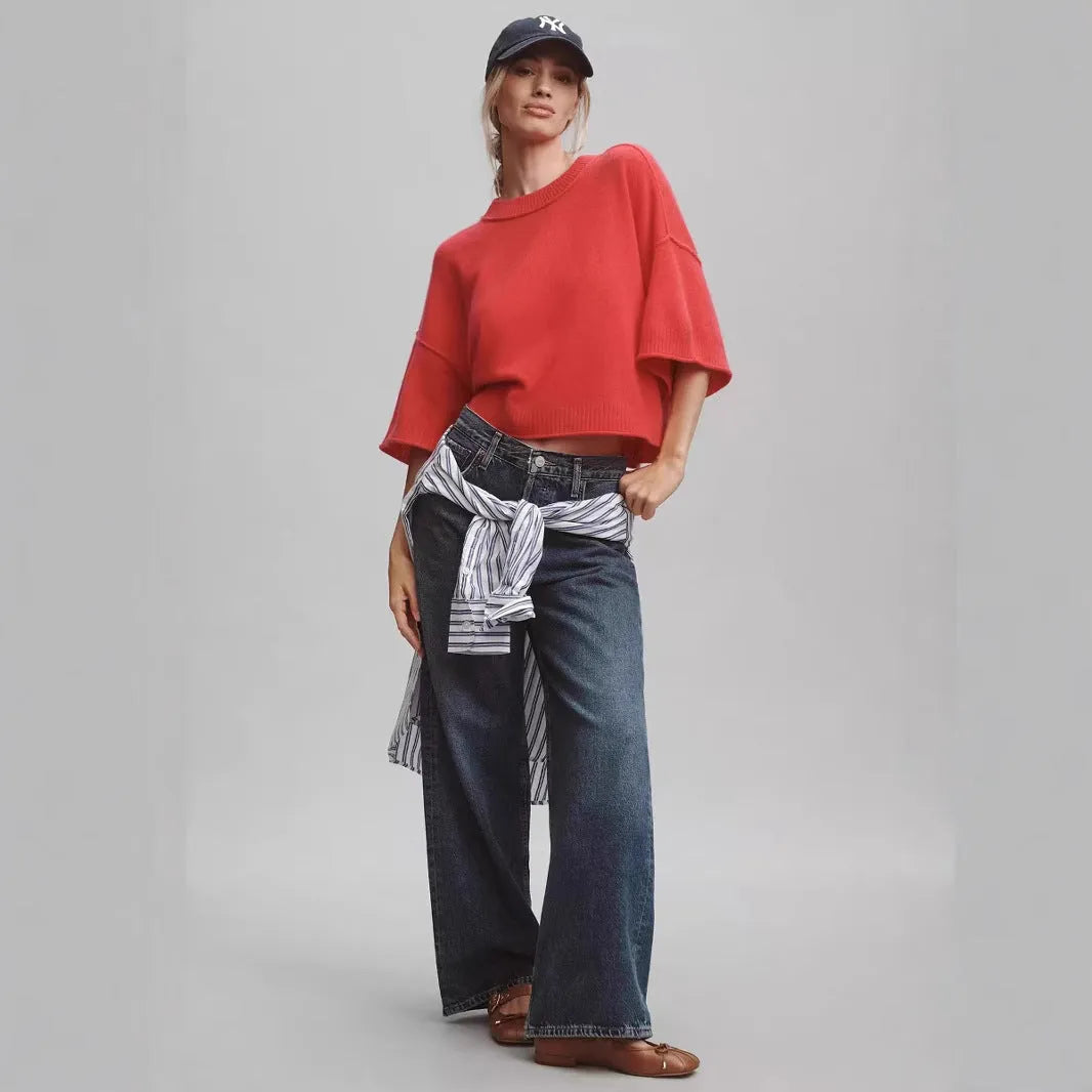 Red short sleeve viscose T-shirt with an exposed navel crop design on a model.