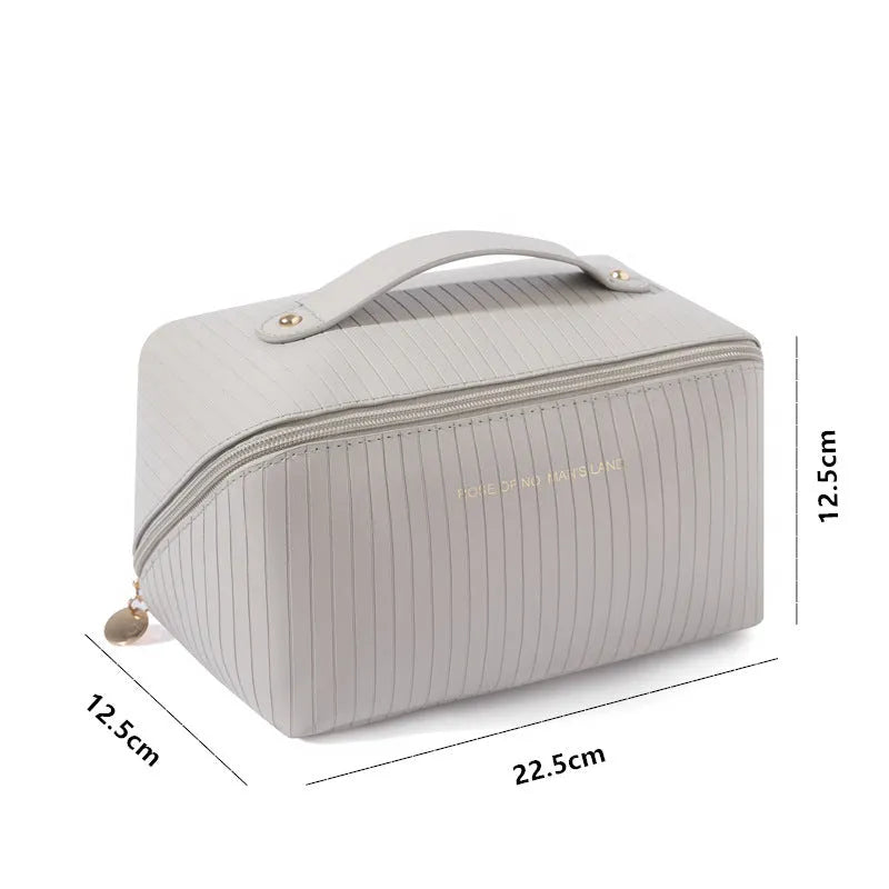 Vertical pattern cubic makeup bag in PU leather measuring 22.5 x 12.5 x 12.5 cm
