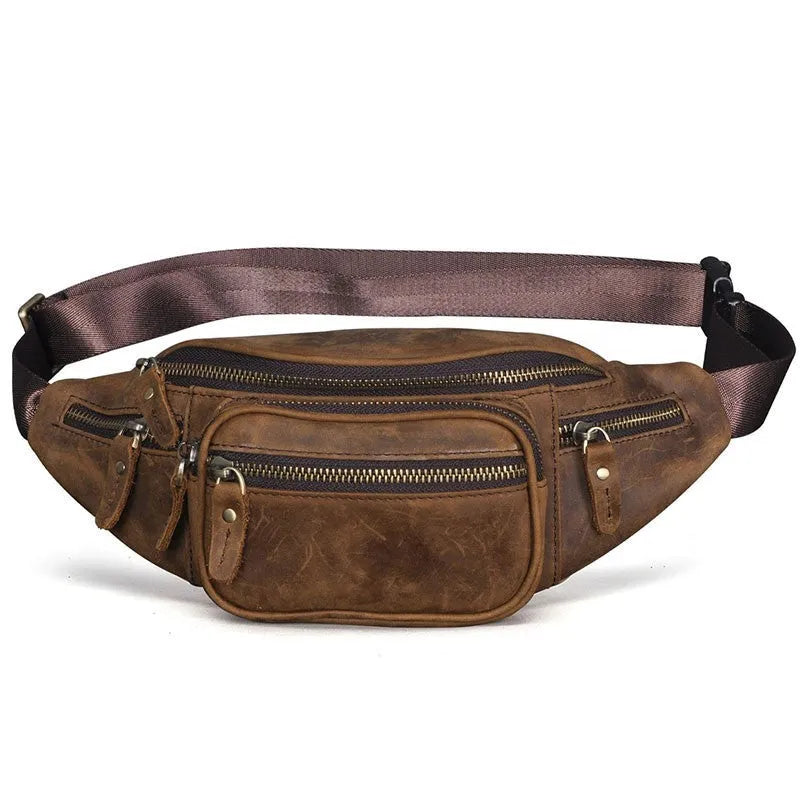 Brown leather retro messenger bag with single shoulder strap showing front compartment and silver hardware