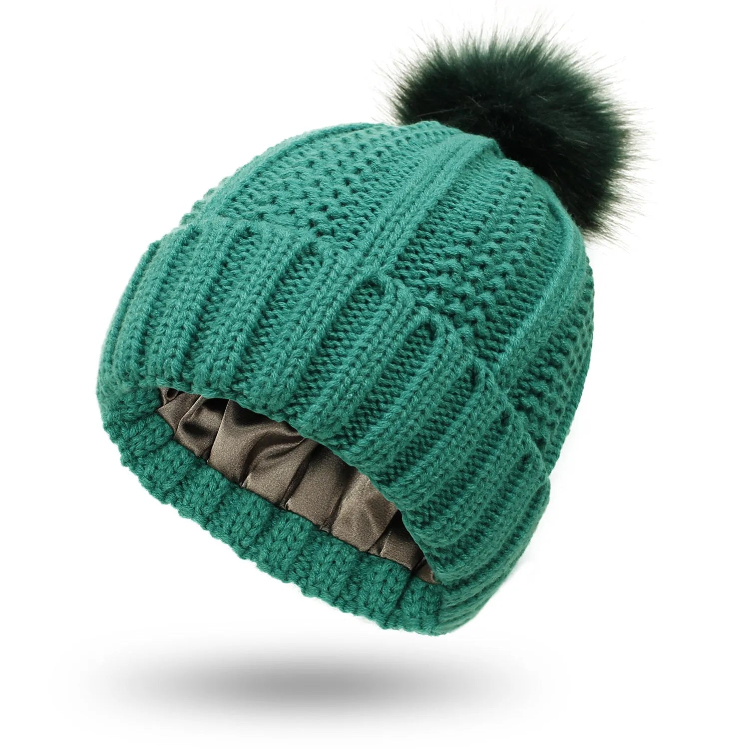 Women's black knit beanie with a faux fur pom pom and satin lining for hair protection