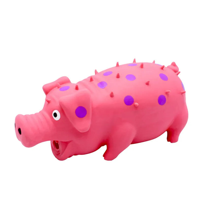 Latex pig-shaped dog chew toy with protruding grain texture in assorted colours
