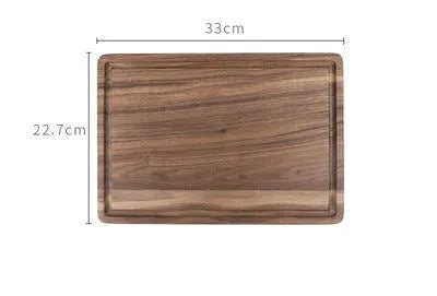 Black walnut wood cutting board with juice groove and side handle shown in three size options