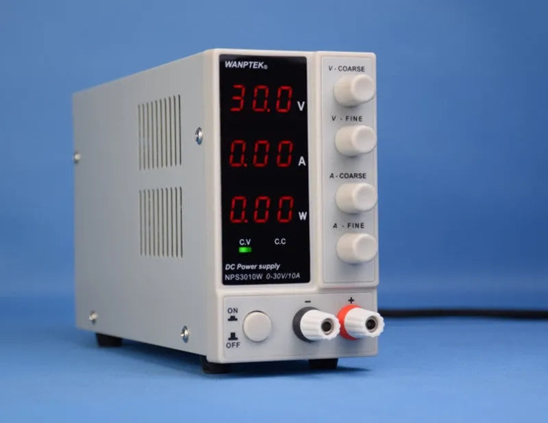White adjustable DC power supply unit with digital display, model S605W, for electronics repair.