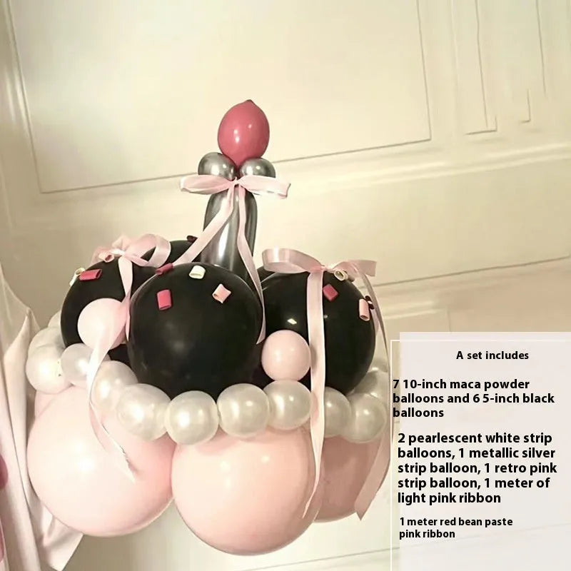 Finished round balloon bouquet decoration for cake table centrepiece.