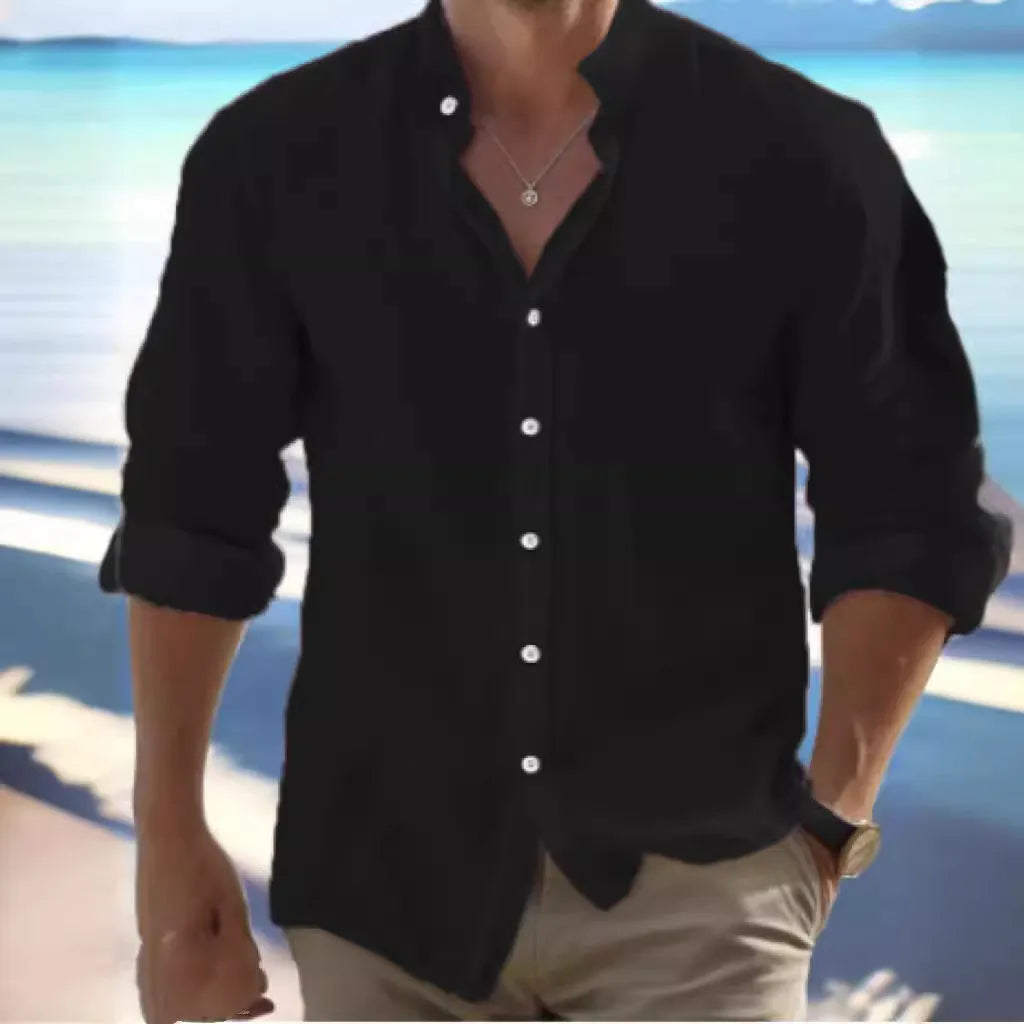 Men's long-staple cotton pullover shirt in light blue with collage stitching detail, laid flat.