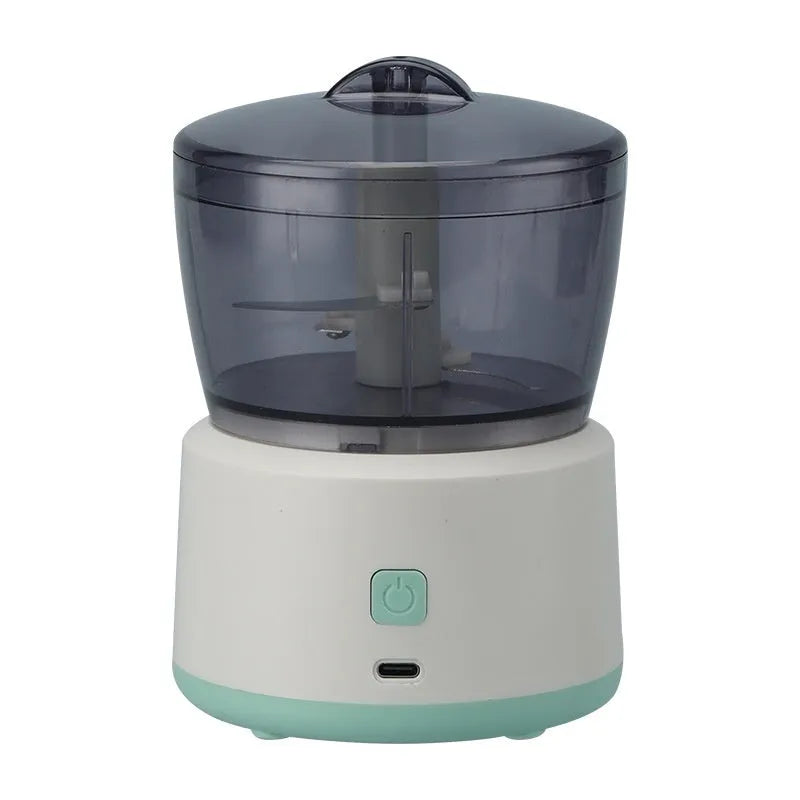 Mini USB rechargeable meat grinder with transparent bowl on anti-slip mat