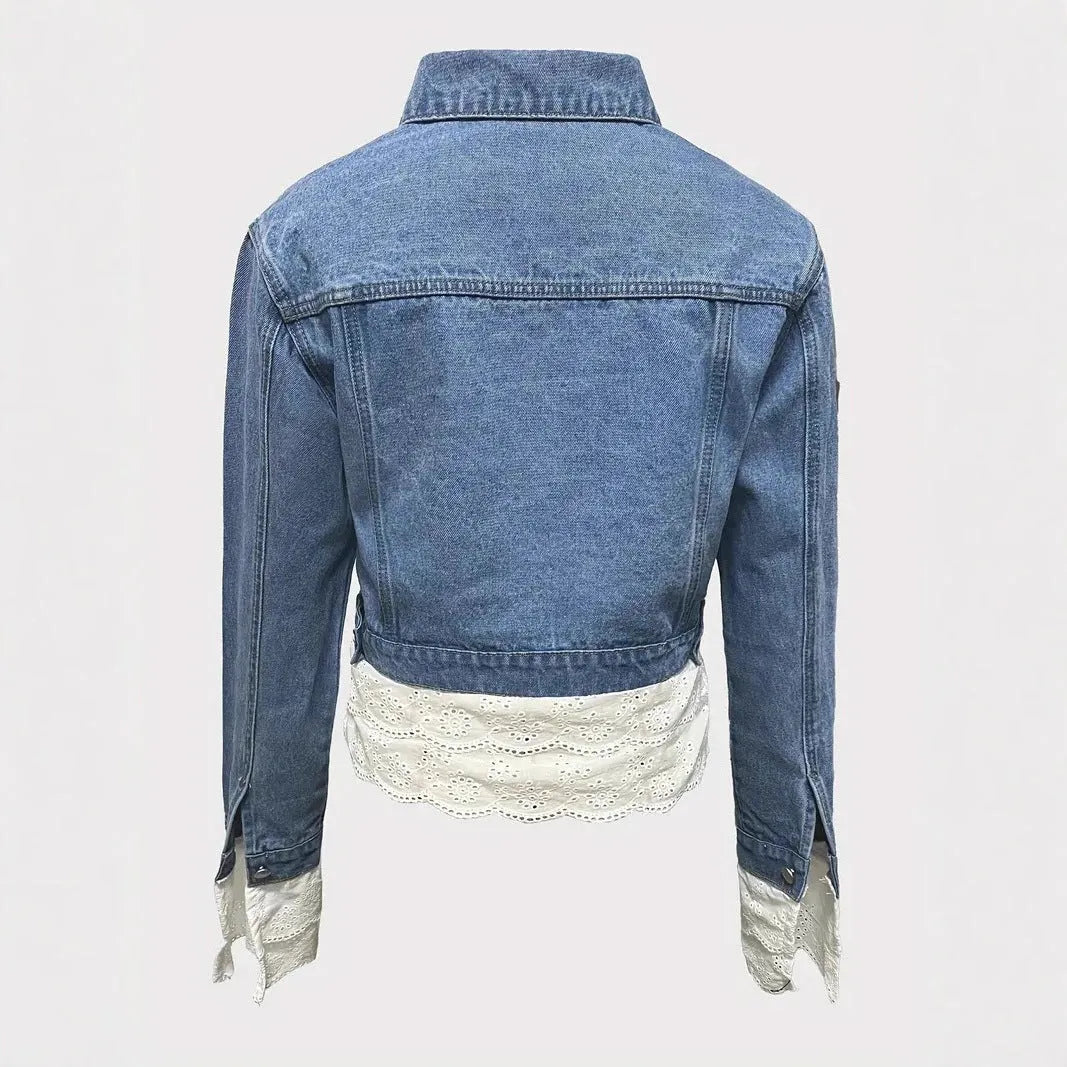 Blue women's denim jacket with lace stitching detail on the front, long sleeves.