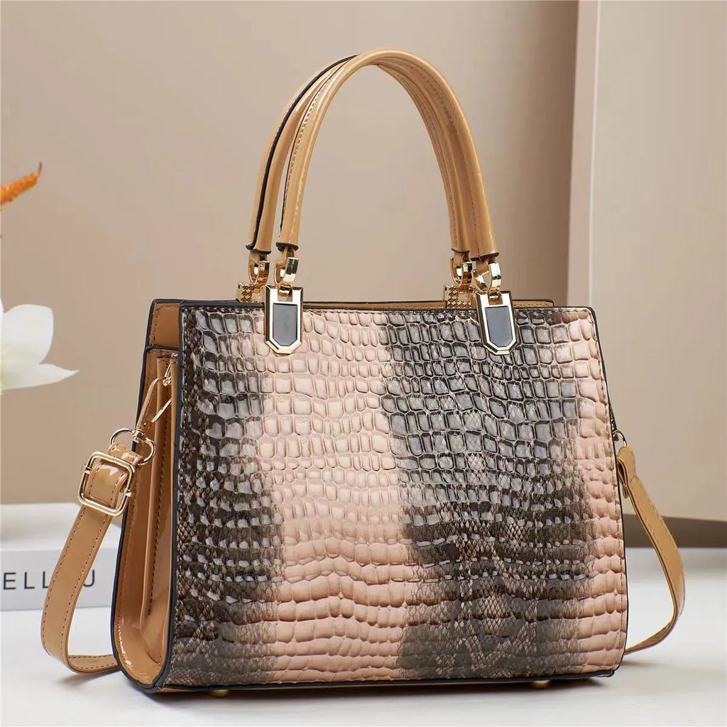 Women's large capacity one shoulder mom bag in khaki colour with internal organisation compartments visible