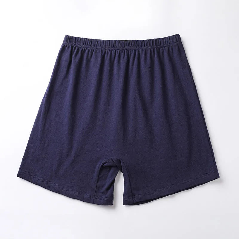Mannequin wearing solid black high waist modal boxer shorts for men