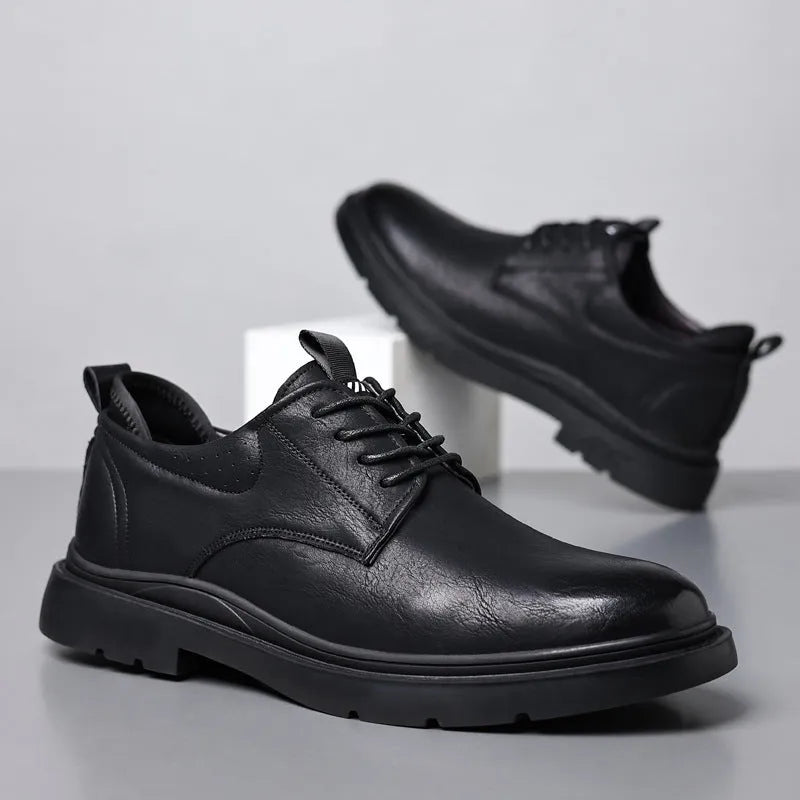 Men's black leather shoes with sewing line details and rubber sole