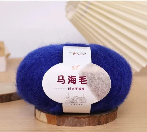 Mohair wool ball for DIY scarf knitting in assorted colours on white background