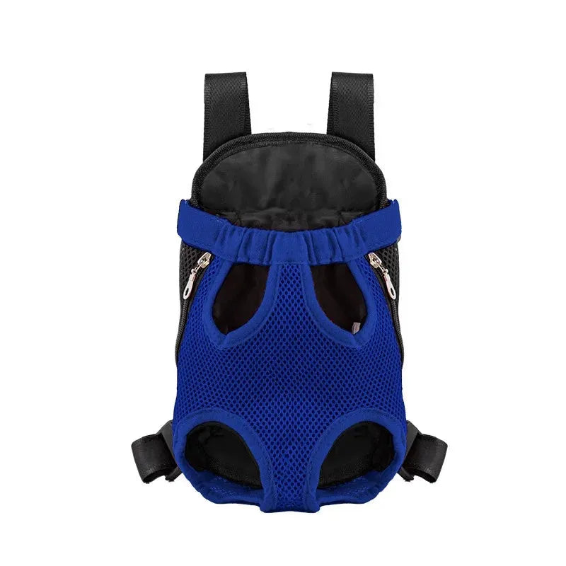 A person wearing a blue nylon dog carrier backpack on their front, containing a small dog. The bag shows mesh panels and an open-top design.