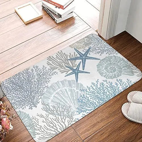 Modern square polyester flannel floor mat showing coastal starfish print design on a wooden floor.