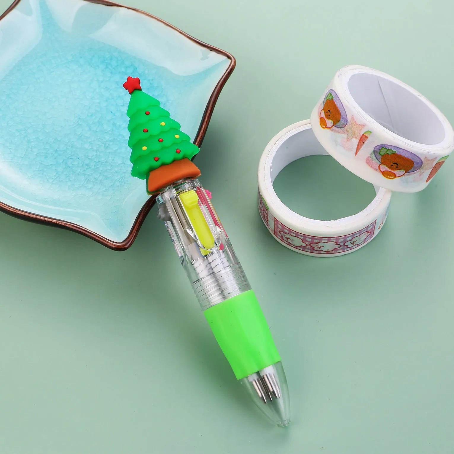 Compact 11cm Christmas four-colour ballpoint pen with press mechanism in festive designs