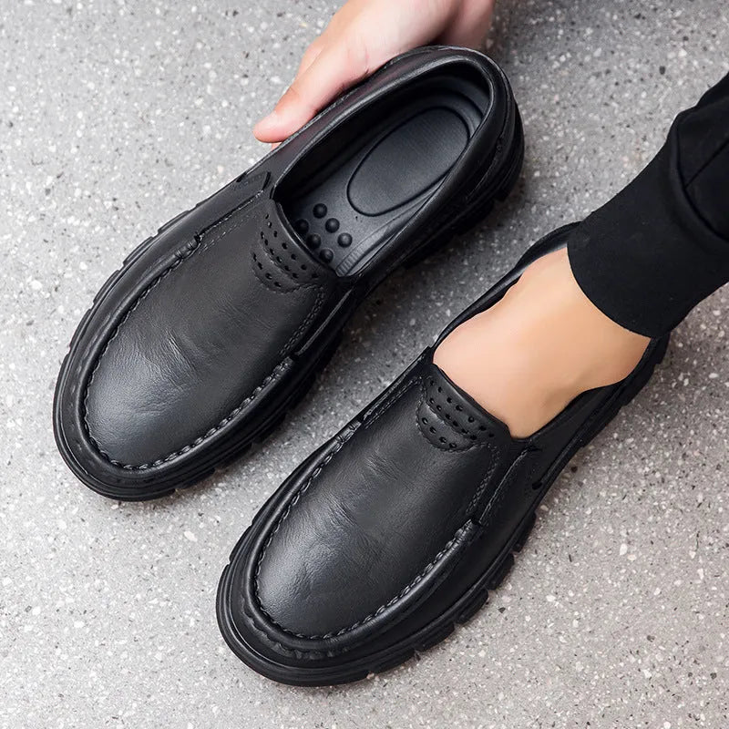 Men's black slip-on platform shoes with an artificial leather upper and a thick EVA sole.
