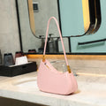Women's oval retro underarm handbag in PU leather, shown in one of seven colours with a single strap and sewing line detail.