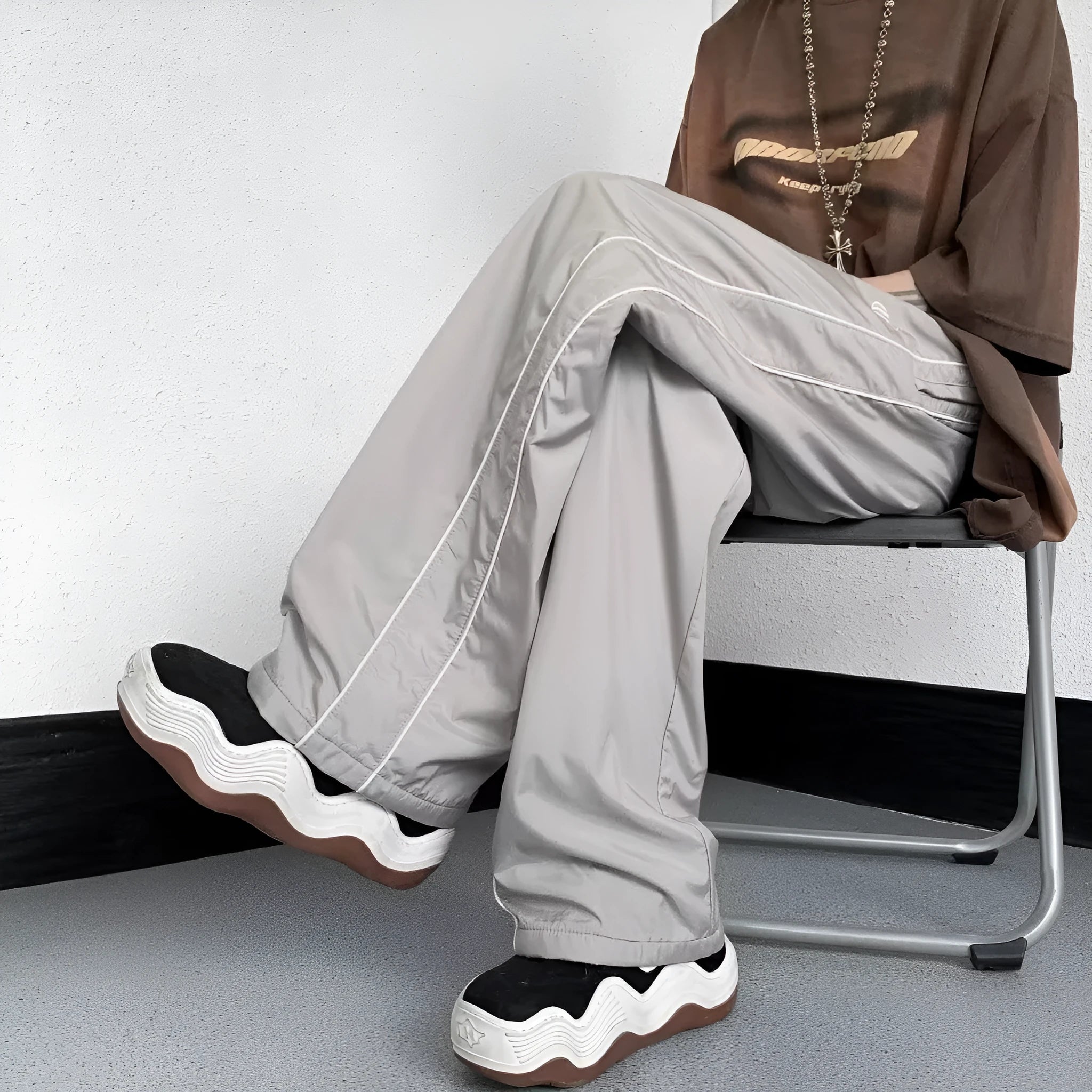 Men's navy blue wide leg striped casual pants made from lightweight polyester fabric, suitable for summer
