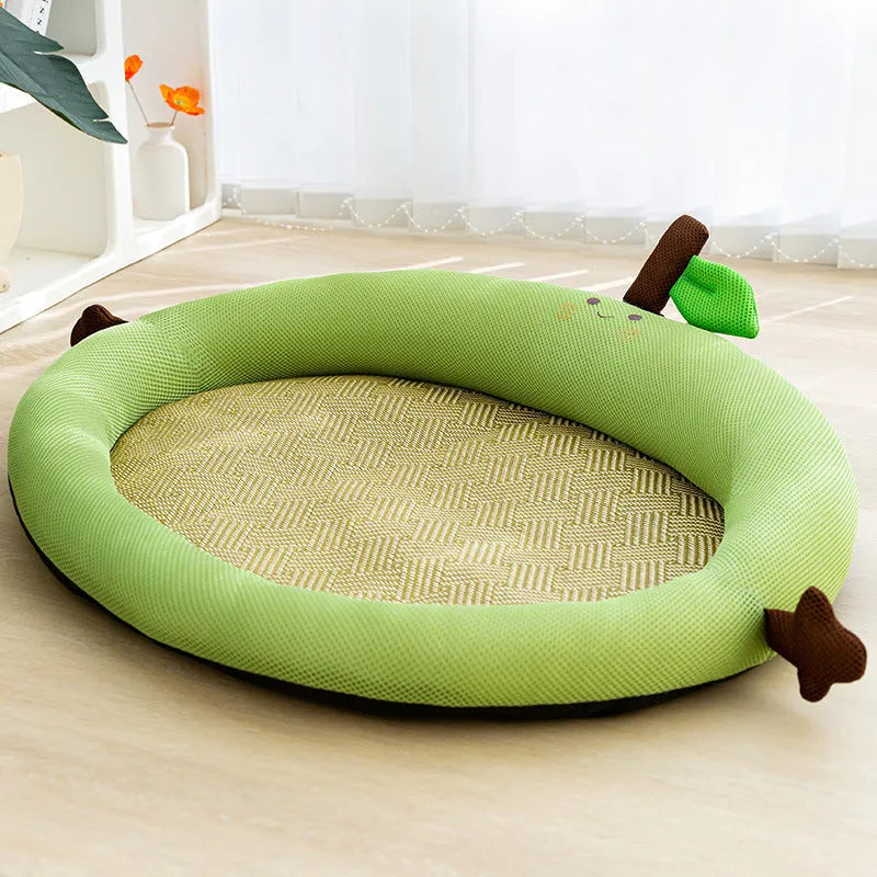 Green pet bed with fruit-patterned backrest, shown in large size for dogs.