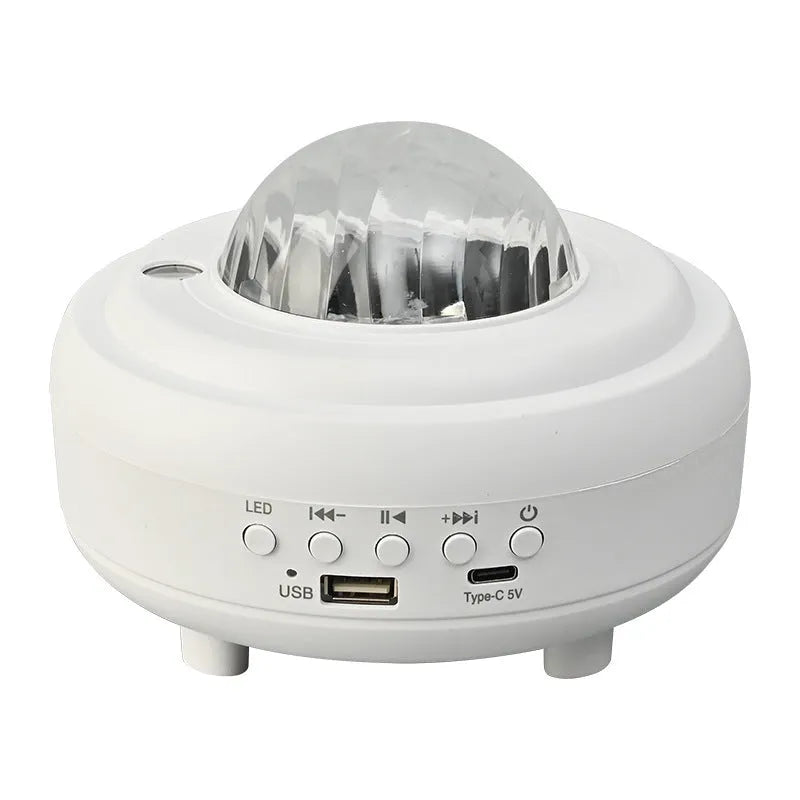 White Bluetooth star projector night light displaying starry sky projection patterns on ceiling