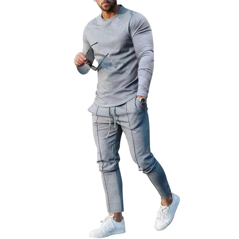 Men's solid colour two-piece polyester tracksuit with long sleeves, shown in apricot colour.