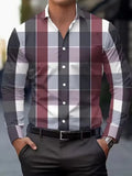 Men's black and blue striped long sleeve shirt with a button lapel collar on a hanger.