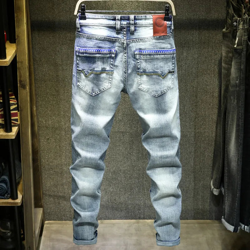 Men's light blue ripped casual jeans in cotton with distressed details, size 28 to 38