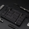 Black Oxford cloth outdoor belt bag with compact 18cm by 3.5cm dimensions for tactical and sports use