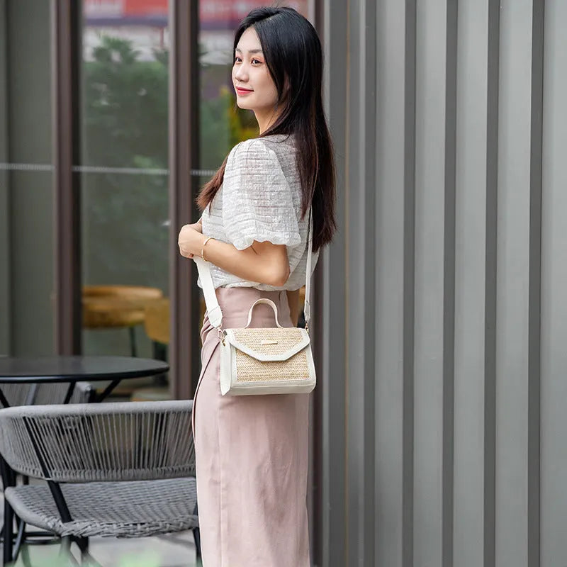 Simple woven sequin decorative crossbody small square straw bag in black with flap closure