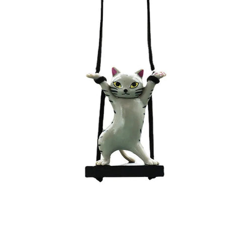 Resin cartoon cat pendant for car interior decoration on adjustable rope.