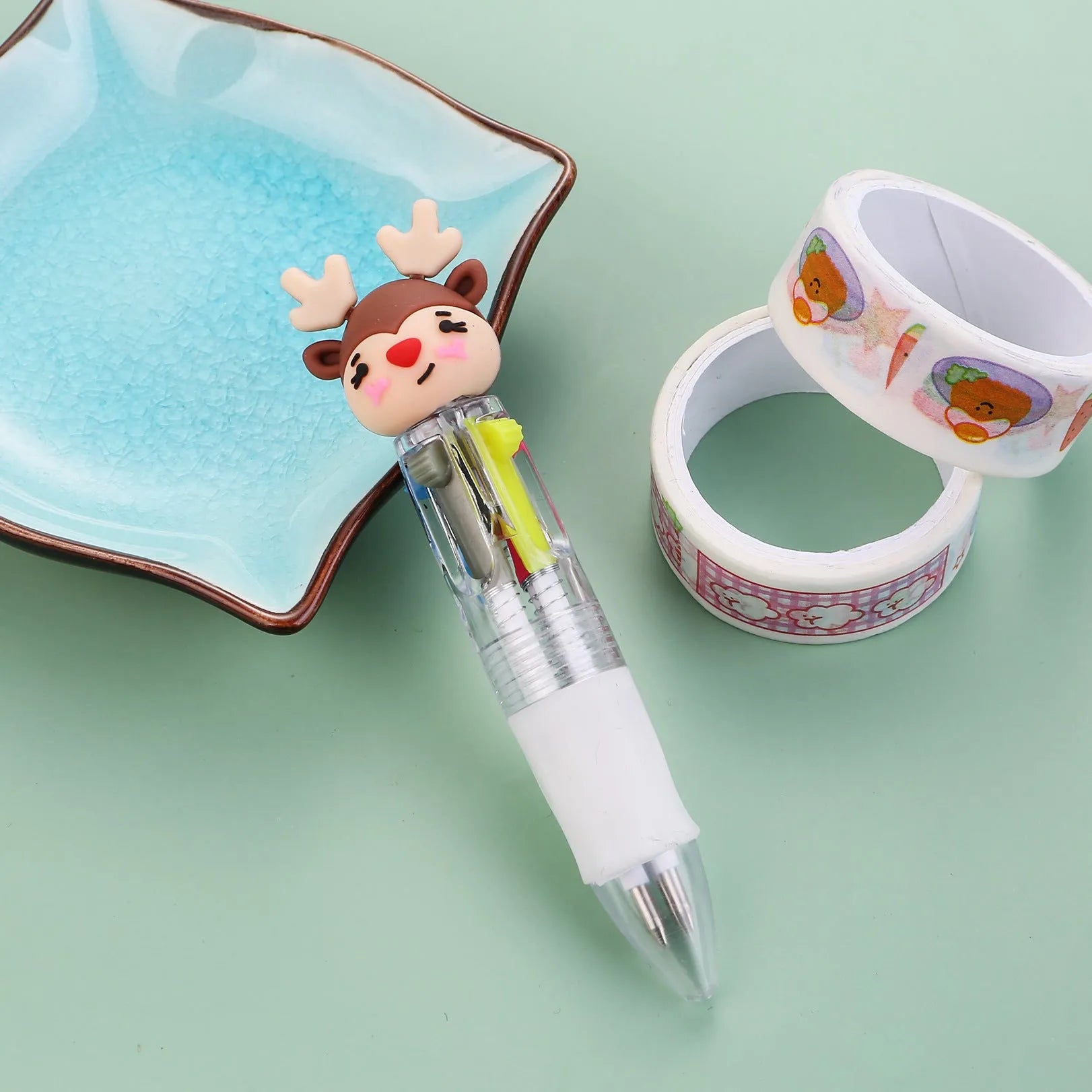Compact 11cm Christmas four-colour ballpoint pen with press mechanism in festive designs