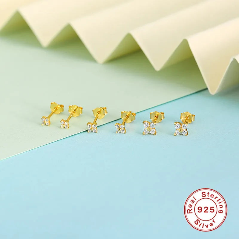S925 sterling silver stud earrings with a petal-shaped crystal flower in gold or platinum finish.