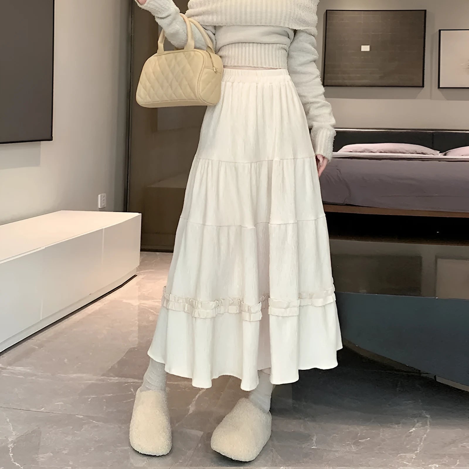 Corduroy A-line midi skirt with elastic waistband in milky white colour showing Korean style design