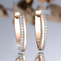 Women's V-shaped geometric ear clips with champagne gold electroplating and white diamond accents