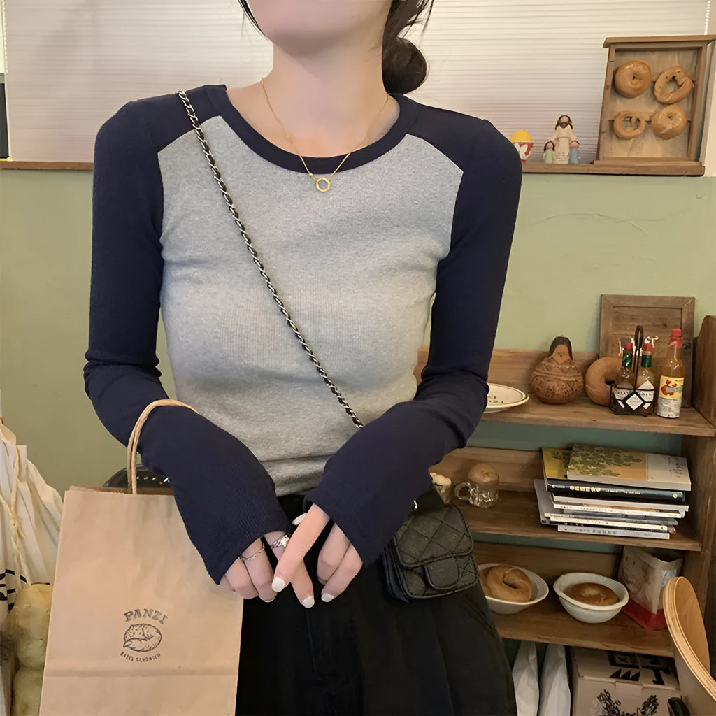 Women's dark blue viscose top with princess sleeves and embroidery detail on slim fit oversized design