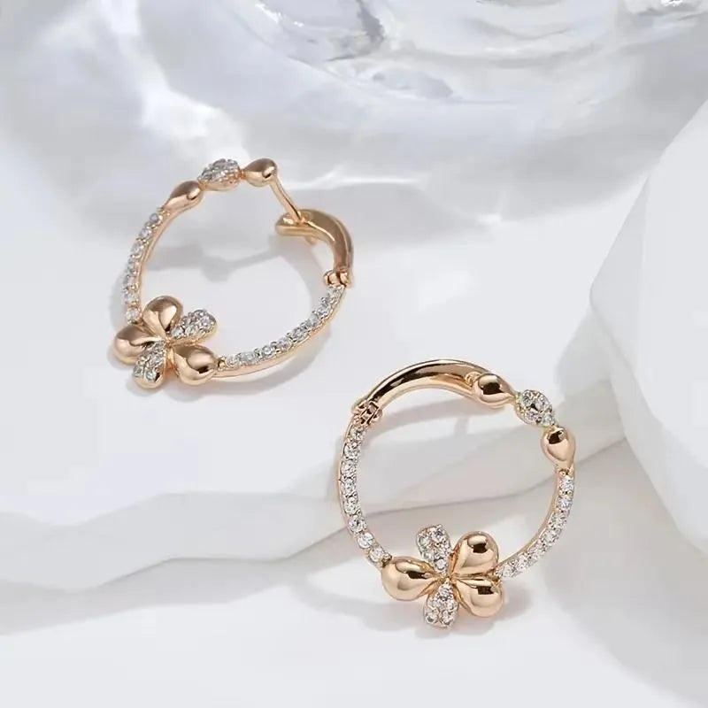 Women's round ring earrings in electroplated copper with geometric design