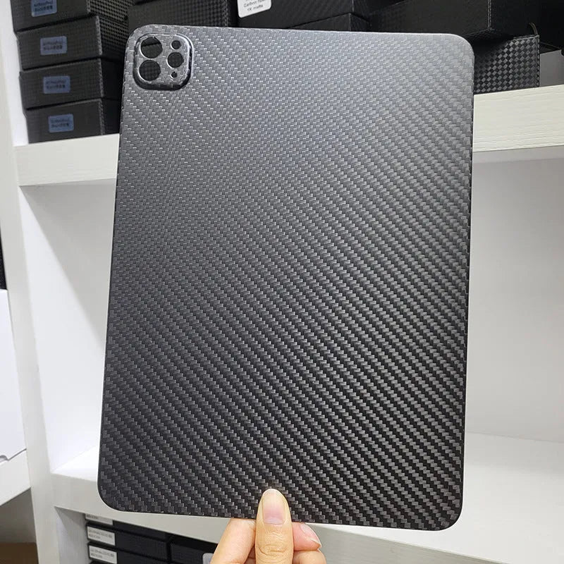Carbon fibre hard protective cover for Apple iPad Pro 11 showing textured plaid pattern.
