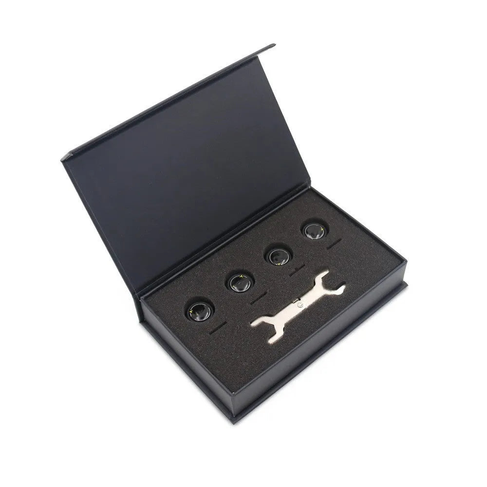 Black Bluetooth 5.0 tyre pressure monitoring kit with four external sensors, wrench, and anti-theft screws