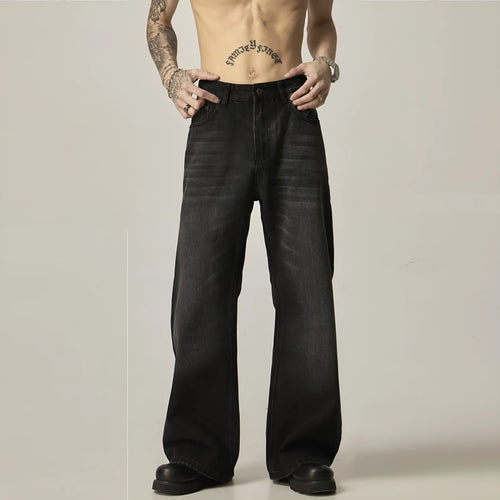 Black loose straight jeans with retro styling and zipper fly in polyester denim fabric