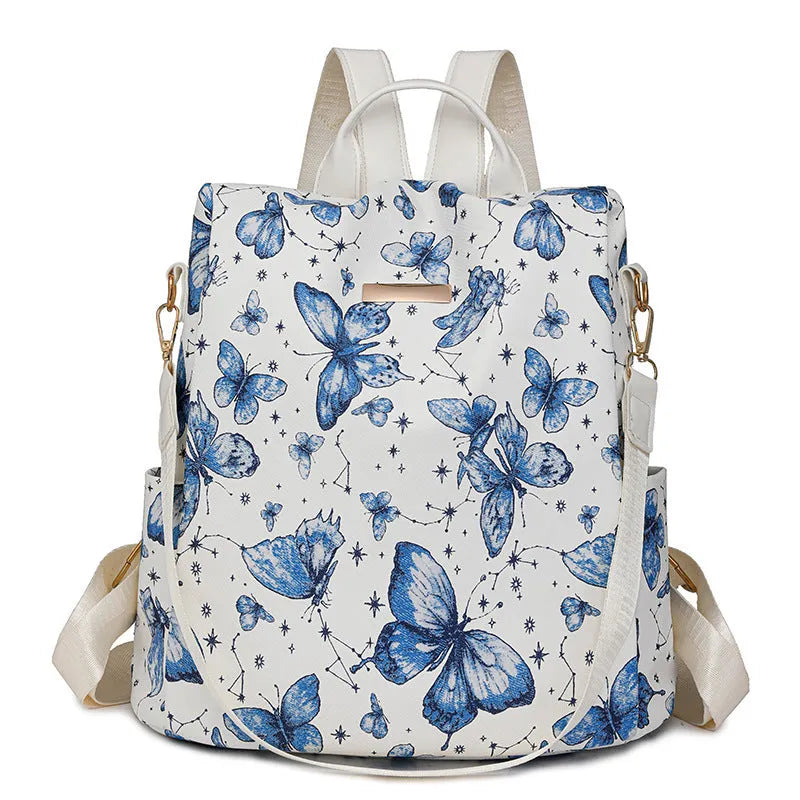 Butterfly printed PU backpack in multiple colours showing sewing line detail and curved backplate