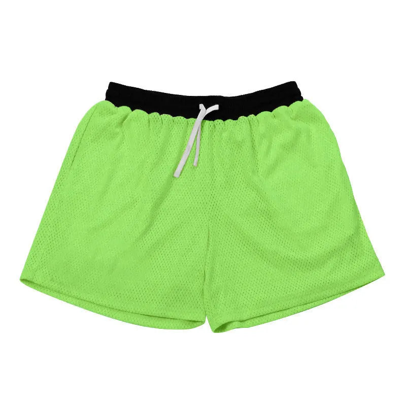 Men's mesh quick-drying shorts in solid colours for running and fitness.