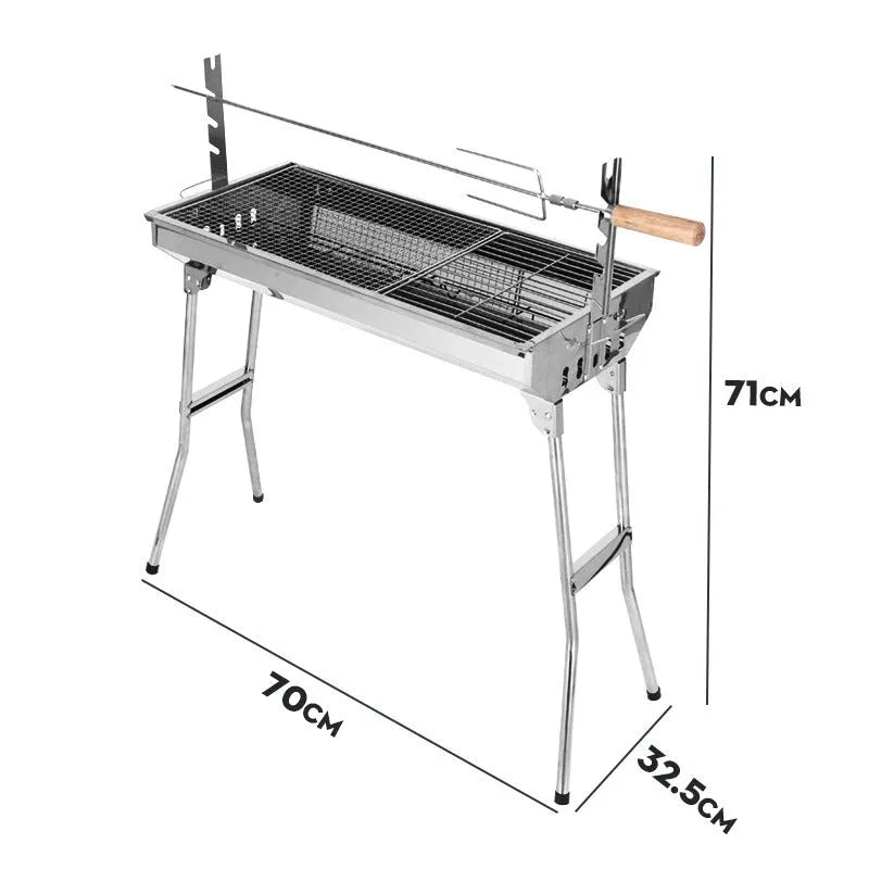 Large stainless steel portable barbecue oven with flip-over charcoal stove design and included grills.