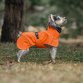 Waterproof polyester dog poncho in British style for small to medium dogs, available in multiple colours
