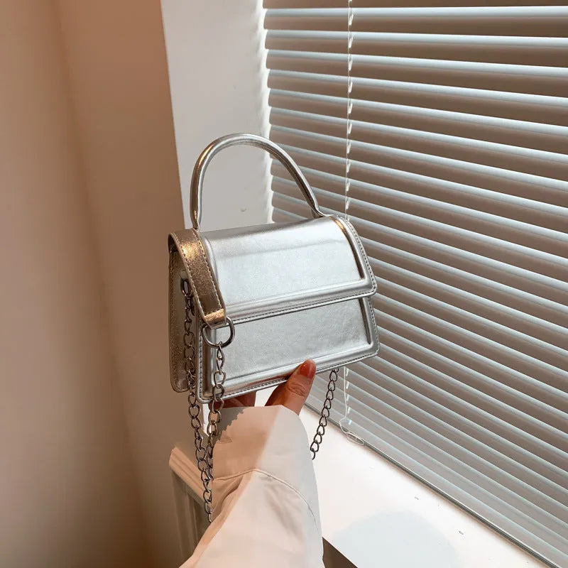Retro PU leather crossbody shoulder bag in horizontal square shape showing sewing line details