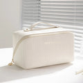 Vertical pattern cubic makeup bag in PU leather measuring 22.5 x 12.5 x 12.5 cm
