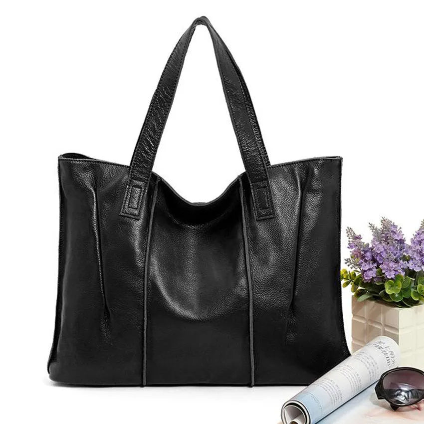 Top grain leather single shoulder tote bag in Apricot colour with stitching and patchwork design