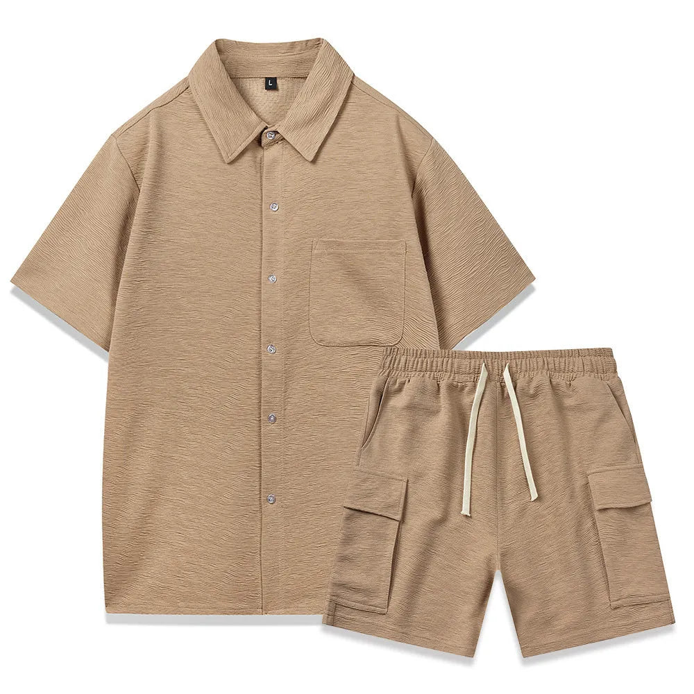 Beige polyester short sleeve top and elastic waist shorts two-piece set laid flat.