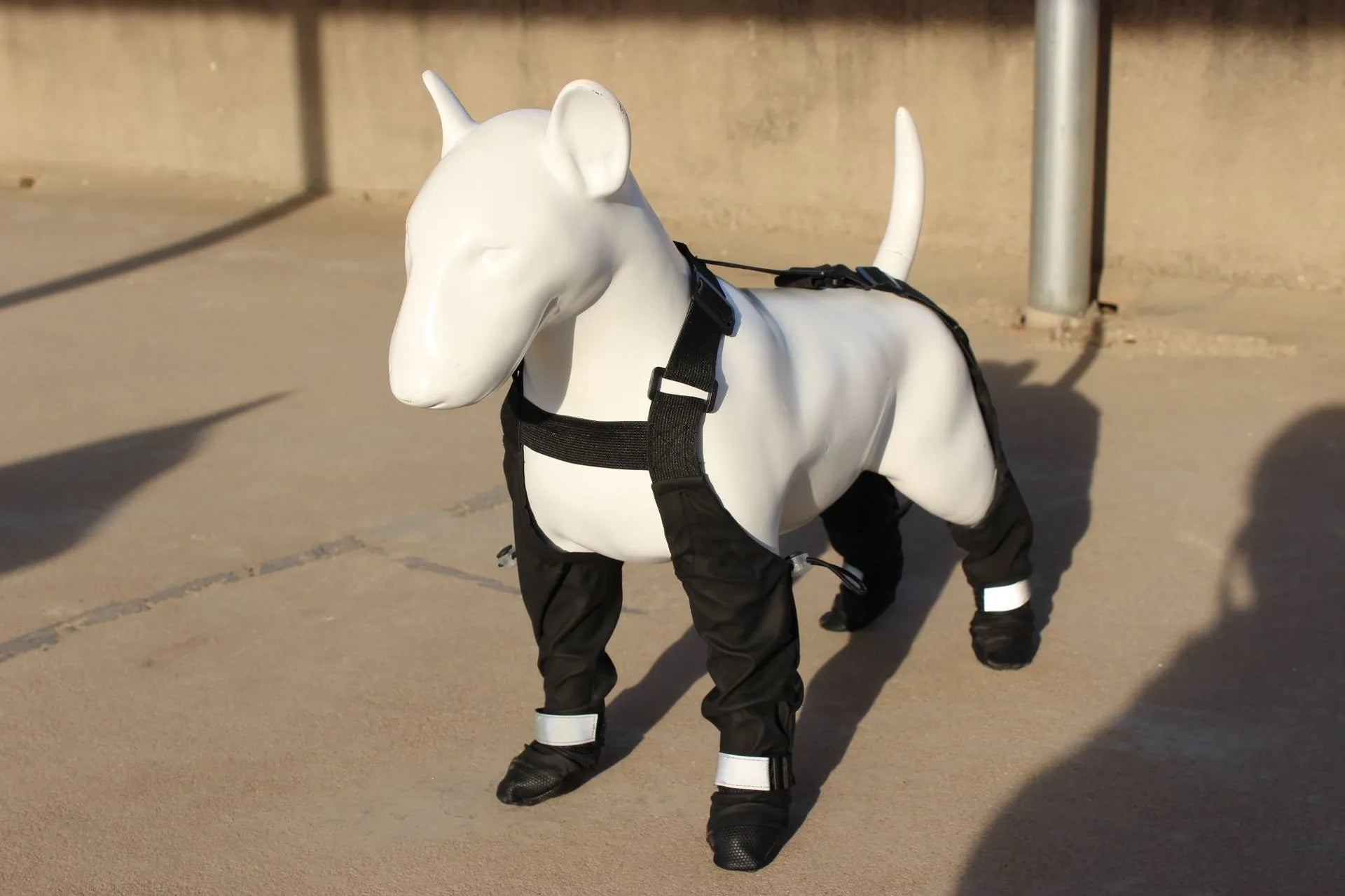 Black waterproof non-slip dog shoes or paw protectors for small to large breed dogs.